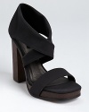 Stretchy matte fabric makes a modern-minimalist statement on Calvin Klein Collection's Fiana sandals.