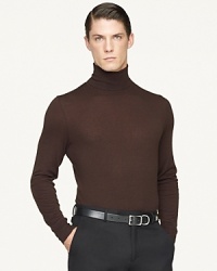 A trim turtleneck sweater is expertly crafted from indulgent Italian cashmere for an equally sumptuous look and feel.