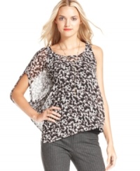 In a modern one-shoulder shape, this RACHEL Rachel Roy printed chiffon top adds femininity to the season's skinny jeans!