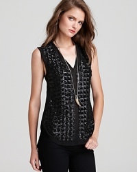 Flaunt modern edge in this futuristic Sachin + Babi top, embellished with sequins for statement shine.