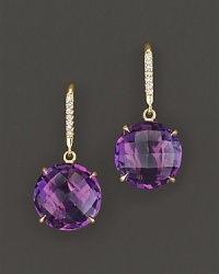 Pavé diamonds and amethyst sparkle in an 18K yellow gold setting.