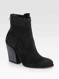 Downtown cool style made of ultra-soft suede, finished with exposed zippers and a towering stacked heel. Stacked heel, 4 (100mm)Suede upperFront and back zipLeather lining and solePadded insoleImported