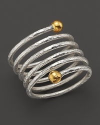 Flexible and stunning, this sterling silver ring is capped with gleaming 24K. yellow gold accents. By Gurhan.