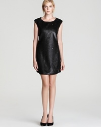 Sequins shine from shoulder to hem on this sparklingly adorable party dress. Accessorize lightly and hit the event.