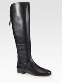 An exposed back zip adds tough-luxe style to this modern leather boot with a stacked heel. Shaft, 18Leg circumference, 14Leather upperExposed back zipLeather lining and solePadded insoleImported