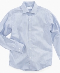 Give him the blues. With this Calvin Klein shirt, traditional color with mod micro stripes add a crisp look to his outfit.