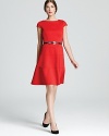 A swing skirt lends a ladylike look to this belted Anne Klein dress.