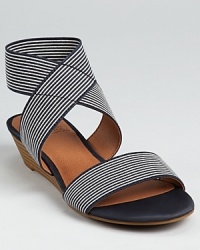 Nautical style gets a subtle lift on these Lucky Brand sandals, boasting a demi-wedge and skinny stripes.