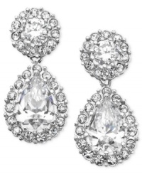 These chandelier-like pear drop earrings will add glowing sophistication to your wardrobe. Cubic zirconia accents set in rhodium-plated silvertone mixed metal. Each measures approximately 3/4 inch.