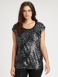 Designed to stand out from the crowd, this jersey top features cheetah foil print and shimmering sequins. Wear this knit design with luxe leather pants or coated-denim jeans.Round neckCap sleevesSequin frontSolid backPull-on styleAbout 28 from shoulder to hemRayonHand washImported