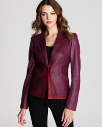 Color blocking crafted in luxe leather reinvents a blazer silhouette from Elie Tahari.