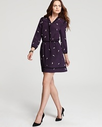 Infused with preppy charm, this Juicy Couture dress flaunts a classic silhouette flocked with a fanciful leaf print. Style with sleek heels for a playful yet polished look.