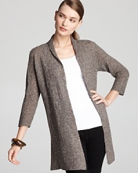 A wear-with-all layering essential, this Eileen Fisher cardigan features a streamlined silhouette in a fresh neutral hue for understated elegance.