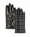 With a tonal check pattern on the back and a soft leather front, these warm wool-lined gloves evoke the classic heritage of Burberry.