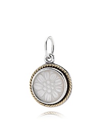 PANDORA's fresh, feminine signet pendant features delicate daisy-engraved mother-of-pearl. A mixed-metal setting of sterling silver and 14K gold completes the look.