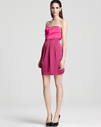 Aqua experiments with the color-block trend in complimentary hues with this ultra-feminine strapless frock.