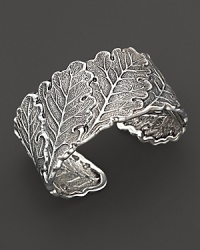 Intricately wrought sterling silver oak leaves bend and fold to form an elegant bracelet. By Buccellati.