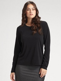 Lightweight and luxurious, this fine silk top can be layered or worn alone. Crew neckline Hand wash Imported