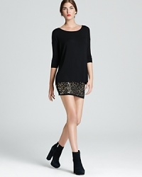 A hardware studded hem exudes edge on Bailey 44's embellished mini dress.