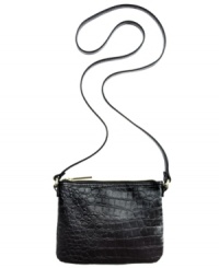 Play up your chic side with this petite design from BCBGeneration that's big on style. Edgy croc-embossed faux leather and signature hardware add some urban cool, while the slender crossbody strap offers instant versatility.