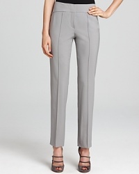 Crisp pleats create a sharp look on these stretch-wool Armani Collezioni pants, perfect for the office this fall with a silk blouse and strappy pumps.