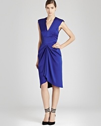 If you're a fan of vivid jewel tones, then REISS's Olga dress is a gem worth acquiring--the pleated detailing and structured shoulders are simply brilliant.