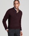 A classic polo design is rendered in uniquely soft merino wool for a plush addition to your sweater wardrobe.