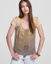 A hypnotic, authentically printed wolf commands your attention with this mesmerizing Chaser tee.