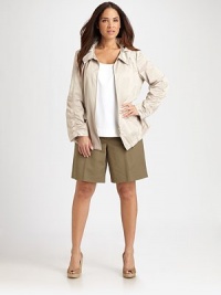 Especially feminine, this lightweight jacket is finished with a ruffled collar.Ruched long sleevesFront zipperDrawstring waist and hemAbout 28 from shoulder to hem80% polyester/20% nylonDry cleanImported