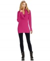 A cable-knit cowl neckline gives this tunic-length sweater from MICHAEL Michael Kors a chic, classic finishing touch.