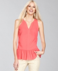 Try out the silhouette of the season -- the peplum -- with INC's petite top. A charming addition to any wardrobe.