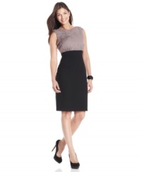 A polka-dot bodice with ruffled, pleated trim is a charismatic finish to Anne Klein's fitted sheath dress.