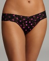 Hanky Panky gives retro polka dots a modern, metallic upgrade with this low-rise lace thong. Style #8S1586.