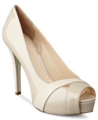 Textured detail and a pretty peep-toe makes the Hershe platform pumps by GUESS an amazing addition to your shoe wardrobe.