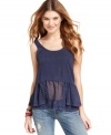 Cute with your favorite jeans, Tommy Girl's tiered-peplum top earns five stars for its effortless and playful style.