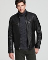 In a heavy leather that keeps in warmth, this Cole Haan moto jacket mixes edge with practicality.