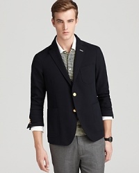 Classic in cotton, GANT Rugger's slim fit navy blazer lends a polished look with gold-tone buttons.