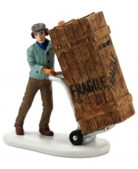 A deliveryman drops off a very tall order for Ralphie's old man in this true-to-life figurine from A Christmas Story Village by Department 56.