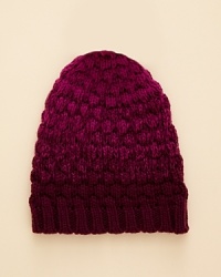 Rendered in a soft knit with a rich gradient dye, this lovely little hat will keep your snow bunny cozy all winter long.