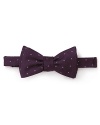 Update the classic bowtie with polka dots to add a brilliant burst of color to your look.