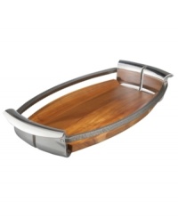 Even ordinary meals get a big reaction with the innovative Anvil serveware tray. Featuring a mix of handsome acacia wood and signature Nambe metal with rustic, iron-finished accents. Designed by Neil Cohen.