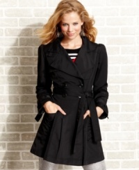 XOXO updates the classic trench coat with adorable puff sleeves and an a-line skirt of crisp pleats.