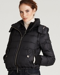 This puffer's got a secret life. Burberry Brit's cool design lets you zip off the sleeves and the hood, and in a flash, it's a vest.