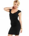 Expert ruching and a wide, decolletage-baring neckline add character to a hot dress of minimalist design! From GUESS?.