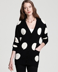 Add a pop of playful to your knitwear repertoire with a kate spade new york cardigan sprinkled with quirky polka dots.