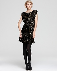 Metallic luster in a flowy blouson style enrich this shiny-chic Alice + Olivia dress and take the guesswork out of dressing for all of your festive occasions.