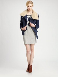 A chic update to a casual classic, in luxe linen with cozy faux-shearling accents, bold buckles and a unique circle hem.Detachable foldover faux-shearling collarLong sleeves with cuffsAsymmetrical zip front closureBuckle closures at collar and hemFront slash pocketsAbout 24 from shoulder to hemBody: linenFaux-fur trim and lining: 60% acrylic/40% polyesterDry cleanImported of French fabricModel shown is 5'11 (180cm) wearing US size Small. 