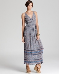 Evoke bohemian elegance in this Joie maxi dress, printed with petite florals and finished with a finely pleated skirt.