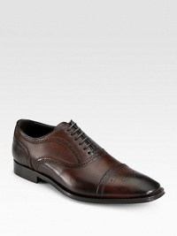 Traditional captoe lace-up is expertly crafted in Italy from smooth calfskin leather with perforated detail and a sturdy, yet supportive leather sole.Leather upperLeather liningPadded insoleLeather soleMade in Italy