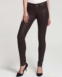 Modernize your denim collection with coated Juicy Couture jeans, gleaming with luxe shine for downtown edge. Team with a structured leather jacket and sleek heels for city-chic polish.